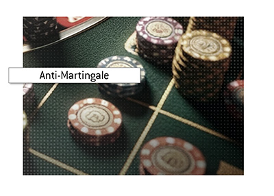 The Anti-Martingale betting strategy. - Roulette table with chips.