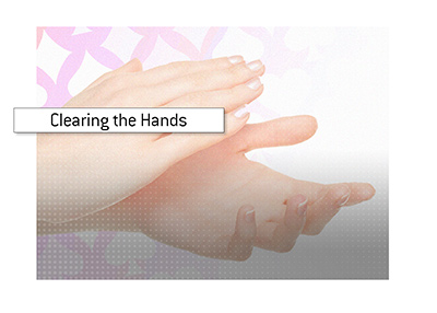 What does the act of clapping hands mean if you are dealer at a casino.