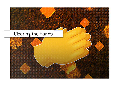 What does the act of clapping hands mean if you are dealer at a casino.