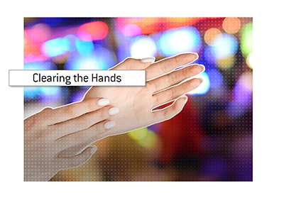 What does the act of clapping hands mean if you are dealer at a casino.