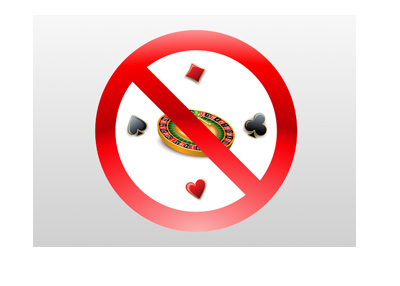 Online gambling ban - Illustration - Roulette wheel and card symbols with a red NO sign on top.